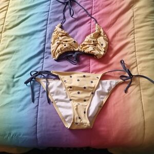 Itty bitty teeny weeny yellow polka dot bikini...